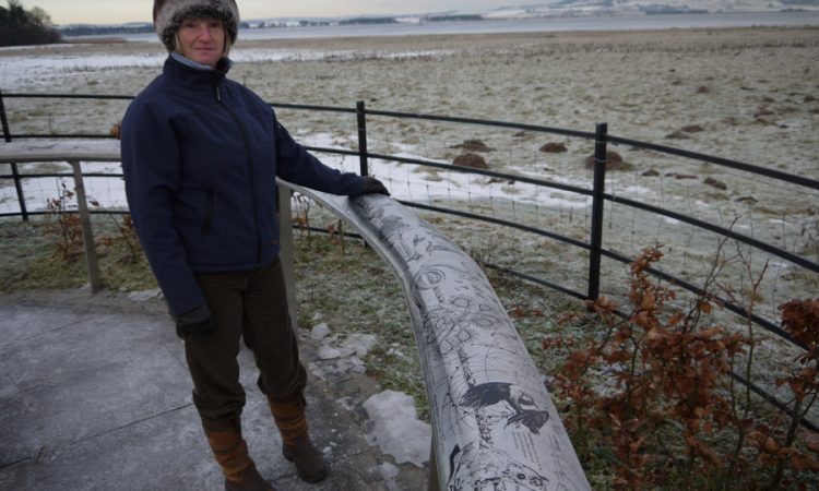 Frozen oval viewpoint sign at Loch Leven