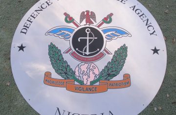 Five foot diamater stainless steel signs