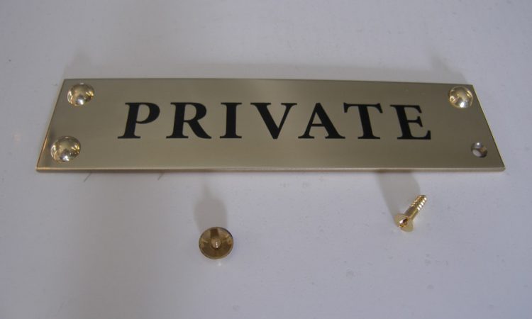 Brass plaque with dome fixings