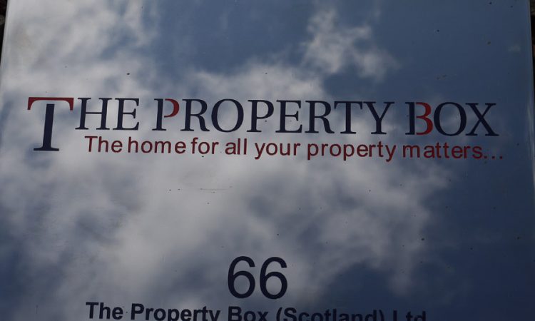 Bright polished stainless steel reflecting the sky