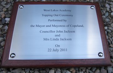 Brushed steel on mahogany