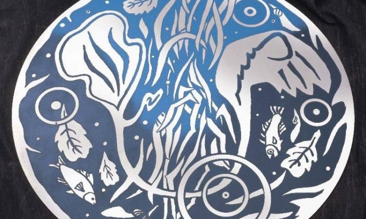 Four foot diameter engraved stainless steel