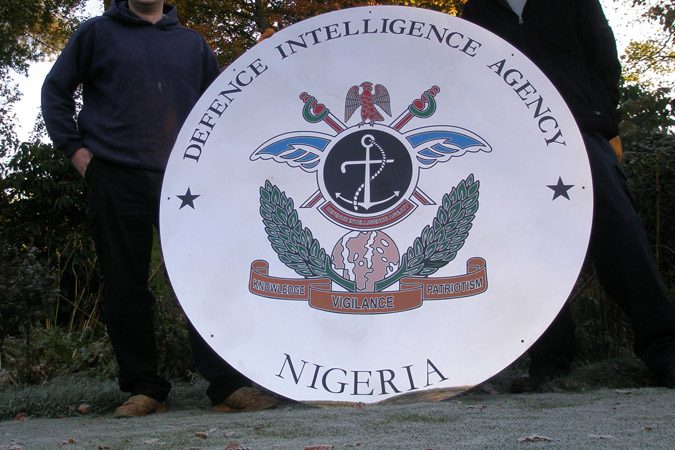 Five foot diamater stainless steel signs