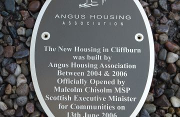 Reverse etched brass oval