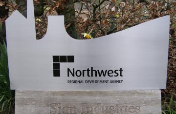 Shaped stainless steel sign