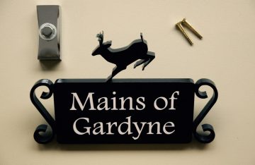 Laser-cut Perspex sign