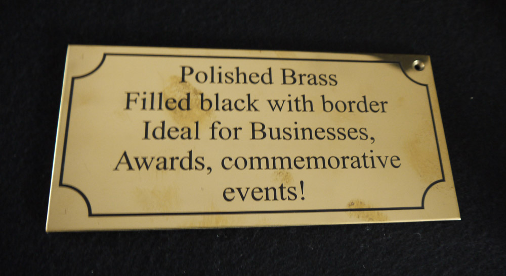 Polishing brass plaques